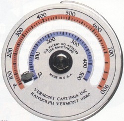 A typical magnetic stovepipe thermometer, marked with maximal burning ranges